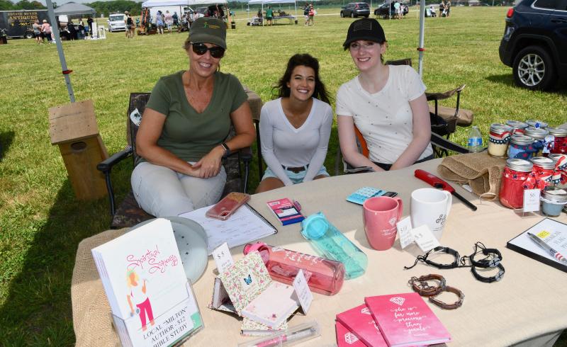 Representing the new Farmer’s Porch in Milton are (l-r) Tammy, Erikka and Lauren Carpenter.