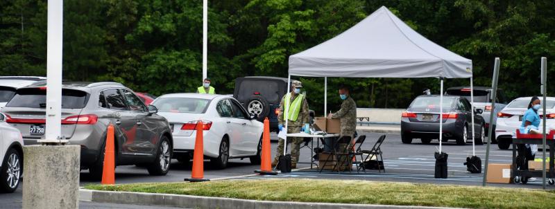 Members of the Delaware Army National Guard process some of the hundreds of people getting COVID-19 tests at Epworth UM Church near Rehoboth Beach.