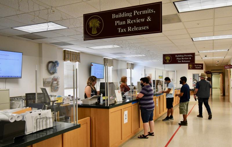 A section of the Sussex County planning and zoning office opened June 29 for walk-in business for the first time since mid-March. Only people making payments and obtaining building permits are allowed in the building. All other business requires an appointment.