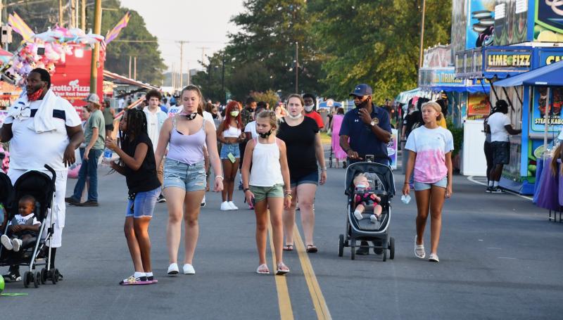When to wear and when not wear face coverings is an ongoing debate. At the Delaware State Fair, face coverings are required when social distancing is not possible.