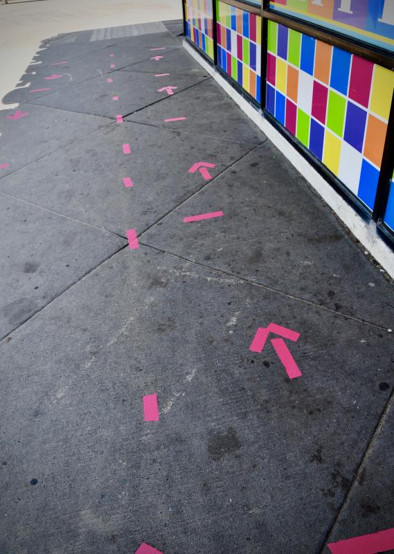 Social-distancing marks direct customers into Candy Kitchen on the Rehoboth Boardwalk.