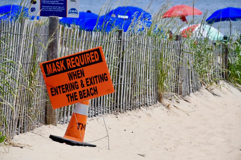 Masks are not required, although suggested, on Rehoboth Beach. However, they are required everywhere else within city limits.