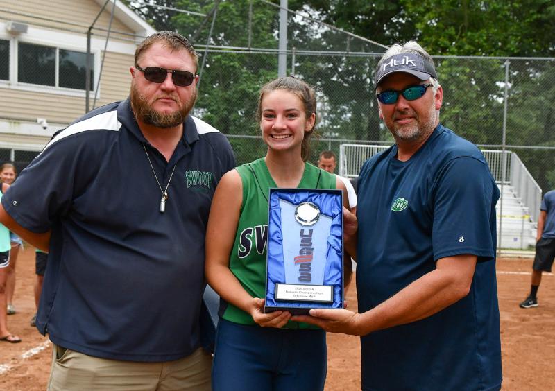 Sierra Livingston, center, receives the offensive MVP Award from coach Sam O’Shields, left, and manager Jay Davis.