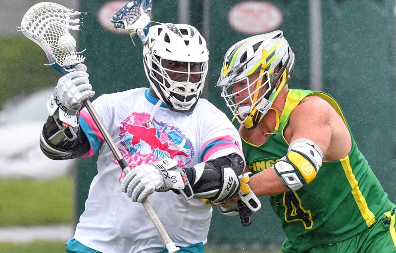 Jack Lingo defenseman Dave Mushrush, right, keeps Dogfish Head attack Randy Belton away from the crease.