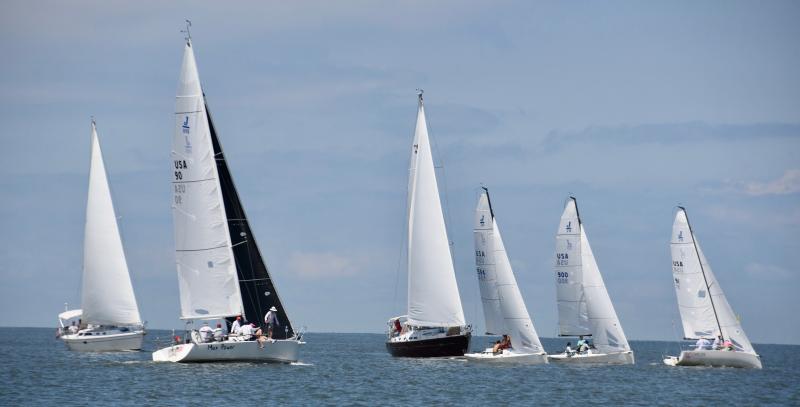 Sailboats prepare for the start of the Cape-to-Cape Challenge XII in a race across Delaware Bay from Lewes to Cape May, N.J. Out in front, Carlos (91), from Corinthian Yacht Club, won the spinnaker-class race. RON MACARTHUR PHOTOS