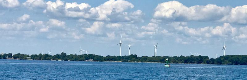 CANADIAN TURBINES - On the Lake Ontario Canadian shore to the north of us, we saw dozens of wind turbines perched on ridges near the lake. We’ve been warned repeatedly to stay out of Canadian waters. Coronavirus. They don’t want us in and we’ve been told there are Canadian border patrol vessel crews writing tickets for violations, with fines in the thousands of dollars. No questions asked, just a big fat fine for being across the line. We’re careful to stay south of that dotted line we see on our charts signifying the border but those dashes don’t show up very well on the surface of the lake.