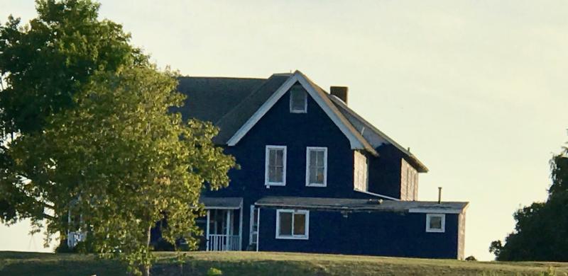 A PAINTERLY SCENE - In last night’s light and with a good stiff rum drink in my hand - Gosling’s, pineapple juice and fresh-squeezed lime juice - this house that sits on the South Bay point near the abandoned castle reminded me of paintings by Edward Hopper and Laura Hickman.