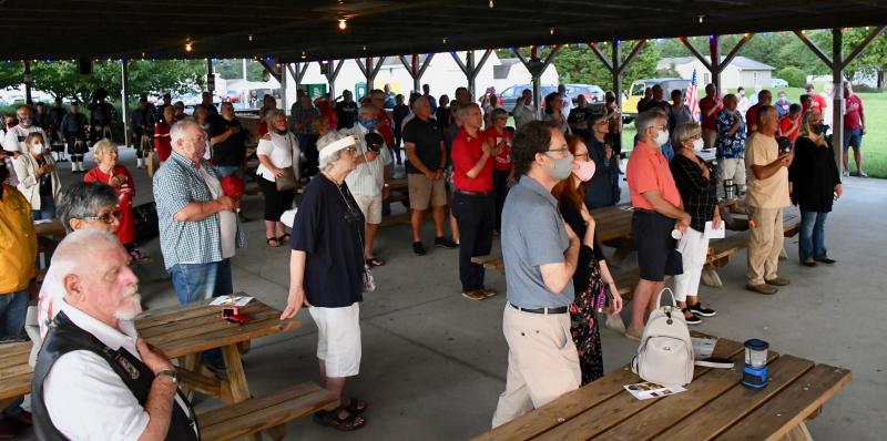 A large crowd gathers under the American Legion Post 28 pavilion for the annual Sept. 11 candlelight ceremony.