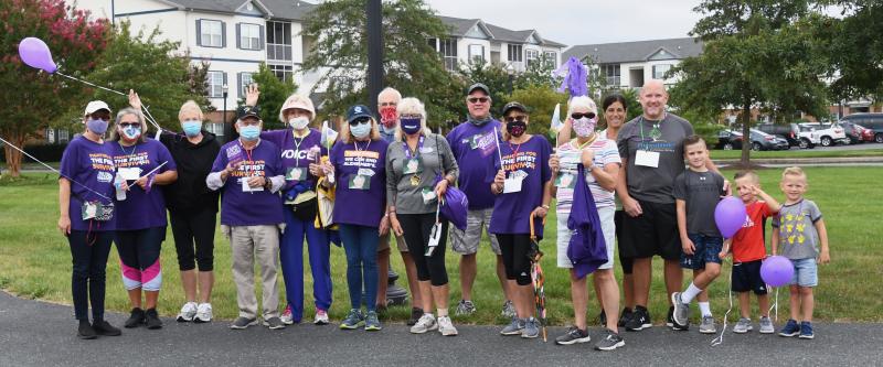Family and friends making up Team Mamamia’s Smile prepare to walk in memory of Mary Fusca.