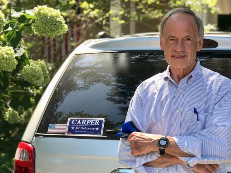 U.S. Sen. Tom Carper stands with the Chrysler Town & Country minivan that has been his mobile office in Delaware since he bought it new in 2001, when Chrysler was still building cars in Delaware. Ethan, one of Carper’s young staffers who drives the senator up and down the state, said the minivan’s odometer broke a few months ago when it read something like 525,000 miles. “I think we’re up to 540,000 miles now,” said Ethan. DENNIS FORNEY PHOTO
