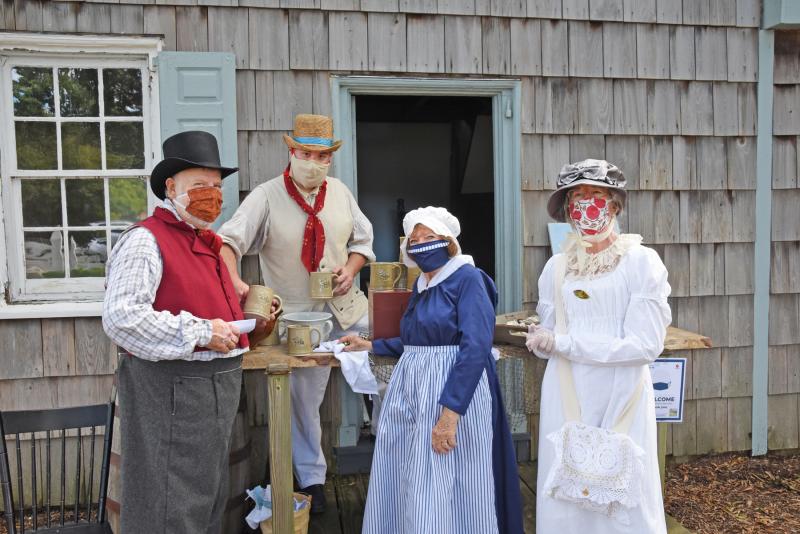 Playing the part of historic Lewes residents are (l-r) Marty Rosenweig aka Cole Clampitt, Marcos Salaverria aka American sailor, Ina Apolito as a barmaid, and Rachael Shapiro aka Hannah Kollock Nunes. NICK ROTH PHOTOS