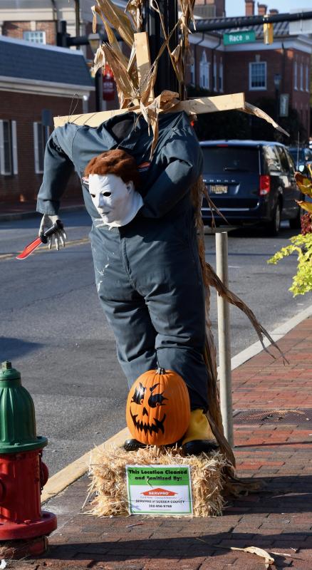This scarecrow, decorated by SERVPRO in downtown Georgetown, has Michael Myers’ head in its hands. RON MACARTHUR PHOTO