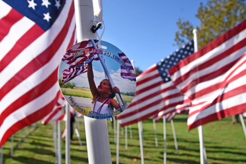 A medallion features a photograph from last year.