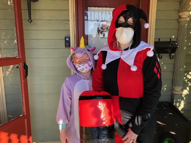 Among those taking part in the costume contest are Angela, right, and Natalia Zinetti, who came to Ogre’s Grove to pick up their free comic books. RYAN MAVITY PHOTO
