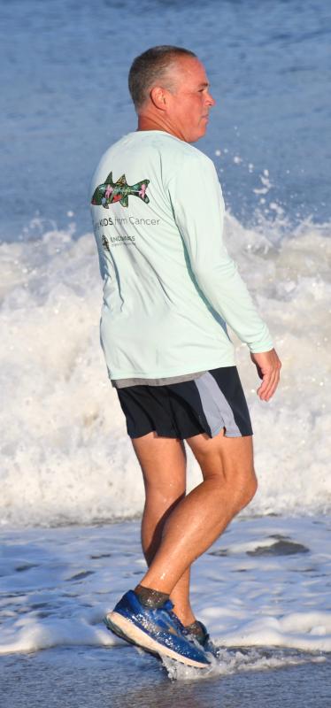 Peter Halper reflects on what he’s just accomplished as he takes in the view at Cape Henlopen State Park.