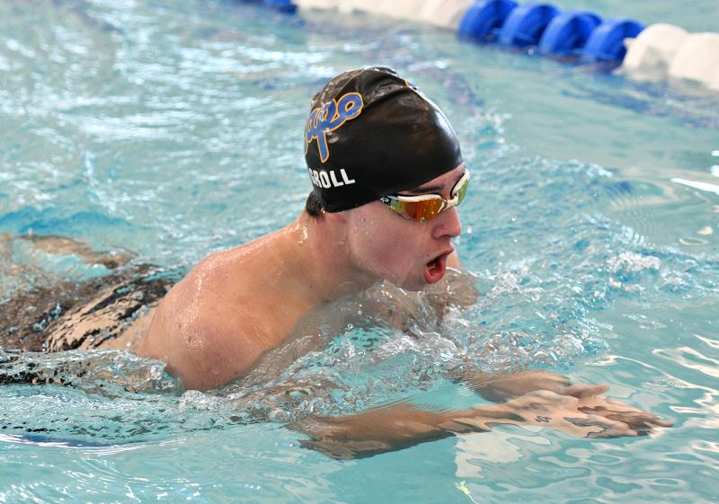Junior Brenden Groll swims the breaststroke.