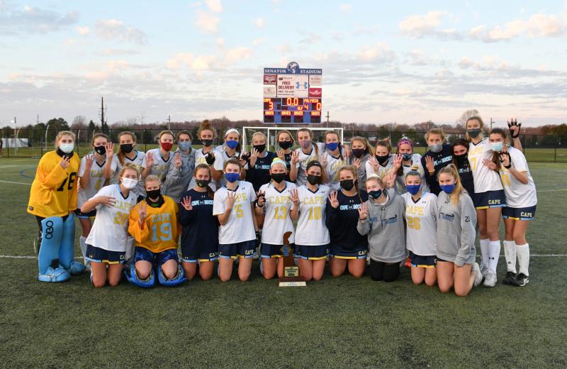 The Cape Henlopen High School field hockey team celebrates the Division I state championship win. Shown in back are (l-r) Morgan Newcomb, Lulu Rishko, Casey Schnupp, Maren Buckaloo, Lindsey D’Ambrogi, Ella Rishko, Molly Mendes, Emma Duffield, Sierra Manifold, Mackinzie Brown, Lexi Truitt, Lily Ashby, Samantha Connors, Sommer Dorman, Carrie Clausius, Anna Lopez, Grace Wiggins and Hannah Maney. In front are Kelly Bragg, Julie Heffernan, Haley Craig, Reagan Ciabattoni, Riley Klopp, Emily Monigle, Riley Keen, Maggie Dawson, Noelle Sabbagh and Lexi Nowakowski. DAN COOK PHOTOS