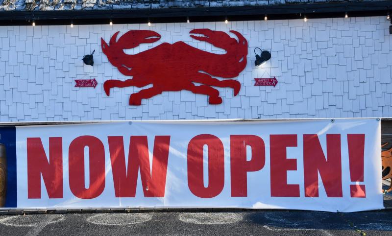 Signs – such as this one at Crabby Dick’s near Rehoboth Beach – are always subject to change depending on state-of-emergency restrictions.