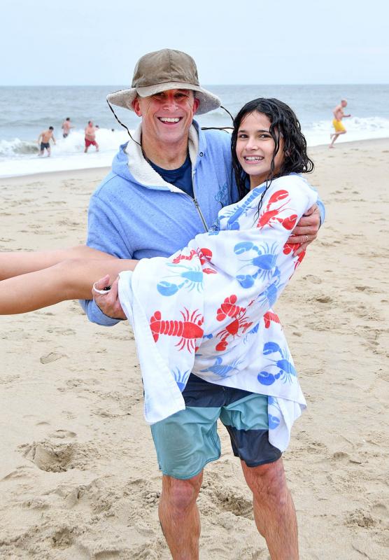 J.D. Miller and his daughter Avary plunge with his mom Connie. Avary was the first baby born in Connecticut at 12:02 a.m., Jan. 1, 2008.