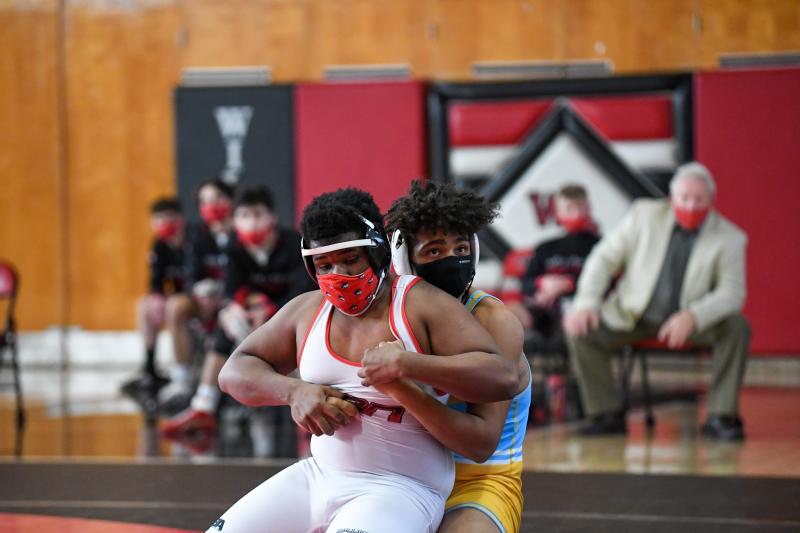 Cape’s Alex Taylor controls Cardire Cook.