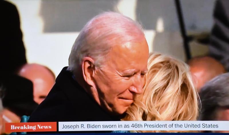 President Joe Biden hugs wife Jill following the Jan. 20 swearing-in ceremony on the steps of the U.S. Capitol. SCREEN SHOT BY RON MACARTHUR