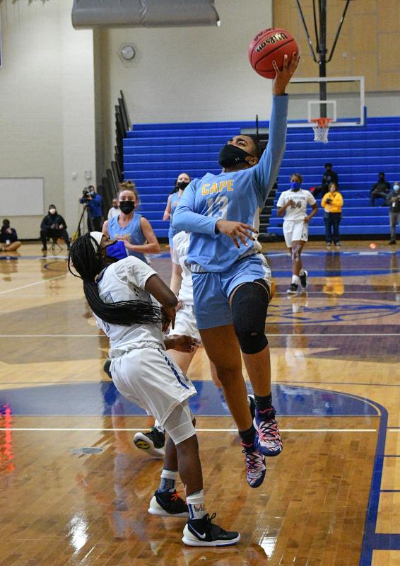 Mehkia Applewhite scores two of her game-high 17 points.