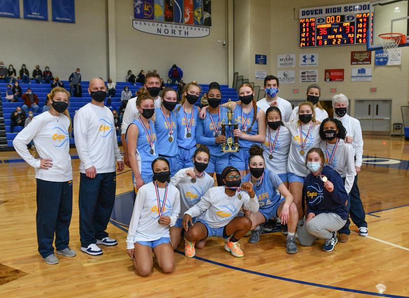 The Cape girls’ basketball team won its second Henlopen Conference crown in the last three years with a 37-36 victory over Woodbridge Feb. 27. Shown in back are (l-r) assistant coach Noelle Alicea, coach Pat Woods, Ella Rishko, assistant Chuck Hudson, Lauryn Head, Destiny Kusen, Mehkia Applewhite, Morgan Mahoney, assistant coach Martin Amis, Grace Totten, Kelly Bragg, assistant coach Jacki Coveleski, Jhayden Holloman and assistant coach Theresa McCloy. In front are Mya Maull, Mackenzie Vitolo, Ja'Onna Lee, Julia Saleur and Diana Nauman. DAN COOK PHOTOS