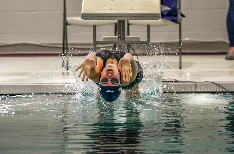 Sussex Academy’s Tess Mariner leaves the blocks in the 100 backstroke. She placed second with a time of 1:03.69.