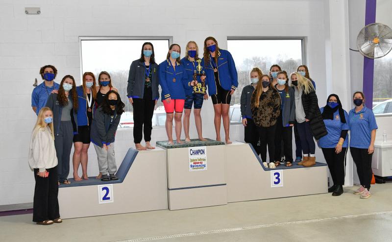 The Caesar Rodney girls’ squad took top honors in the Henlopen Conference Championship meet. Shown (l-r) are Katherine Outten, head coach Kyle Williamson, Abby Cholewa, Lily Wagner, Olivia Gaines, and Puiyee Kong; Victoria May, Georgia May, Zoe Edelman, and Danielle Stewart; Paige Hardee, Riley Buchman, Haley Lisiecki, Sophie Kammer, Mckelden Miller, Natalie Lewis and assistant coach Noelle Mouhtarim and Julie Edelman.