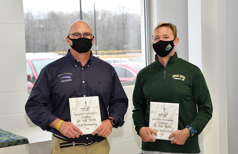The Henlopen Conference girls Coach of the Year Award was presented to Sussex Academy’s Tom Martiner, left, while the boys’ Coach of the Year Award was presented to Indian River’s Colin Crandell.