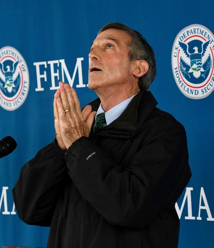 Gov. John Carney looks skyward when he talks about hoping to get back to normal events, including those at Dover International Speedway.