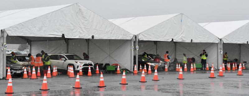 Tents are set up for a six-day COVID-19 vaccination clinic at Dover International Speedway, ending Friday, Feb. 26. Officials plan to vaccinate nearly 19,000 people with second doses during the event.