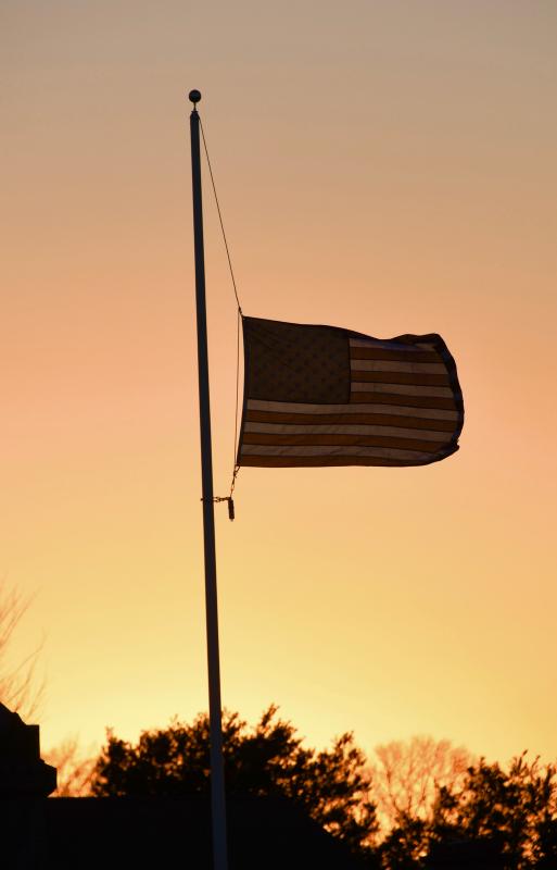 American flags are flying at half-staff in memory of the 500,000 who have died from COVID-19 over the past 11 months.