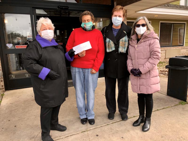 Check presentation attendees shown are (l-r) VIA President Ann Sebastian; Toni Short, director of Sheltering Heart/Lighthouse for Broken Wings; VIA member Susan Siemionko; and Karen Dettwyler, VIA chair for civic engagement and outreach. SUBMITTED PHOTO