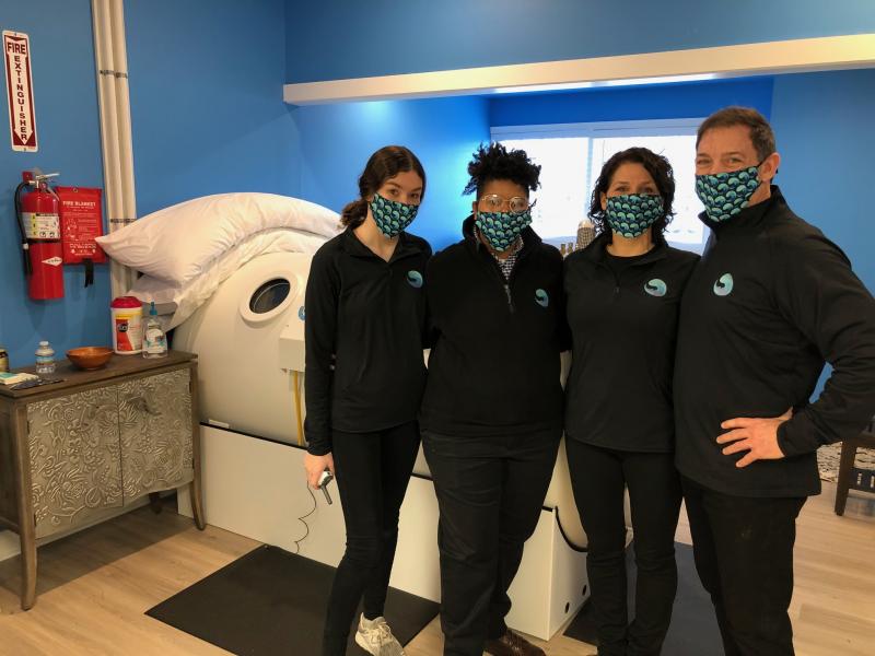 Delaware Hyperbarics has opened an integrated healing center in Lewes. The facility features a 42-inch-diameter hyperbaric chamber that can help in recovery from surgery, sports injury or illness. The team includes (l-r) Madison Caldwell, Alex Williams, and co-founders Liz Guida and Steve Caldwell. RYAN MAVITY PHOTOS