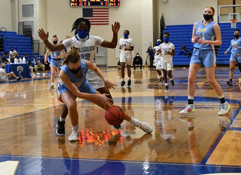 Destiny Kusen makes a save to Morgan Mahoney.