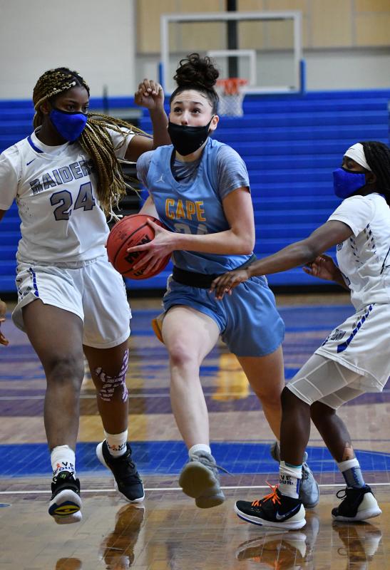 Julia Saleur splits the Woodbridge defense and scores.