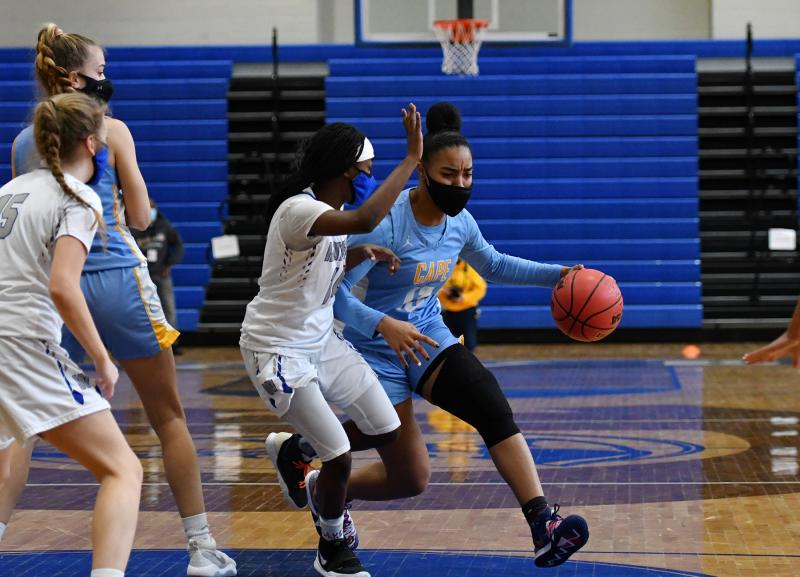 Mehkia Applewhite drives to the paint.