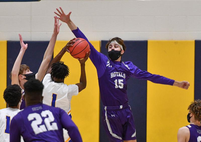 Delmarva Christian senior Chase Hesson, right, goes for the block on Central’s Dontae Spencer in the 39-38 win over the Knights. DAN COOK PHOTOS