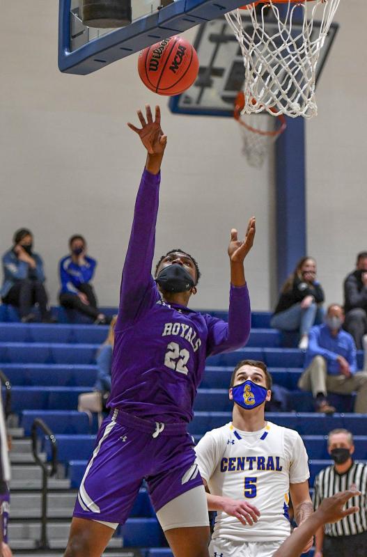 Jayson Handy hits a basket for the Royals.