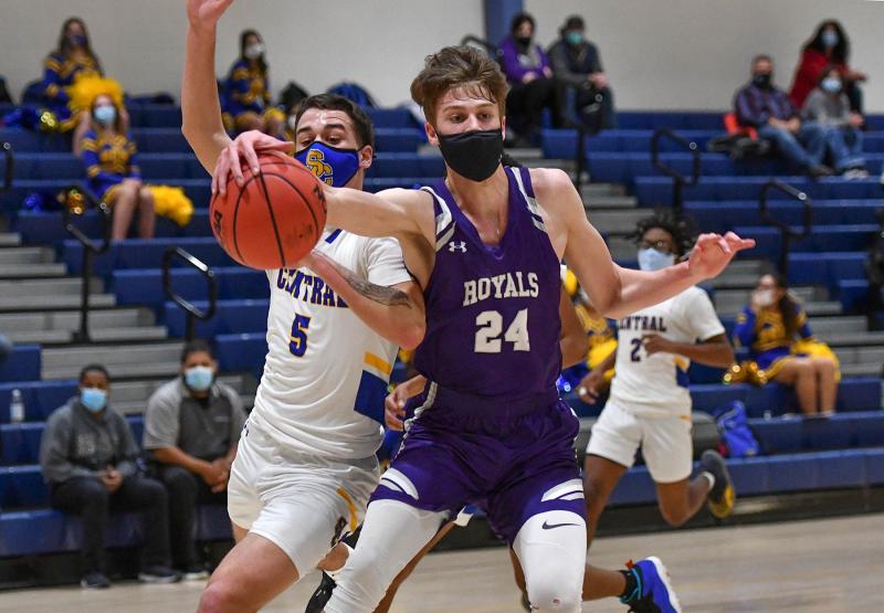 Delmarva Christian’s Zach Smith snags a loose ball.