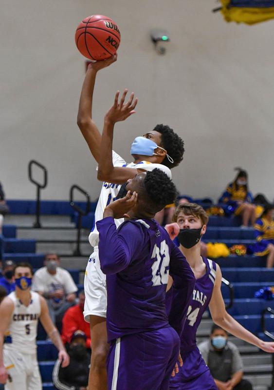 Malachi Waters hits for the Knights.