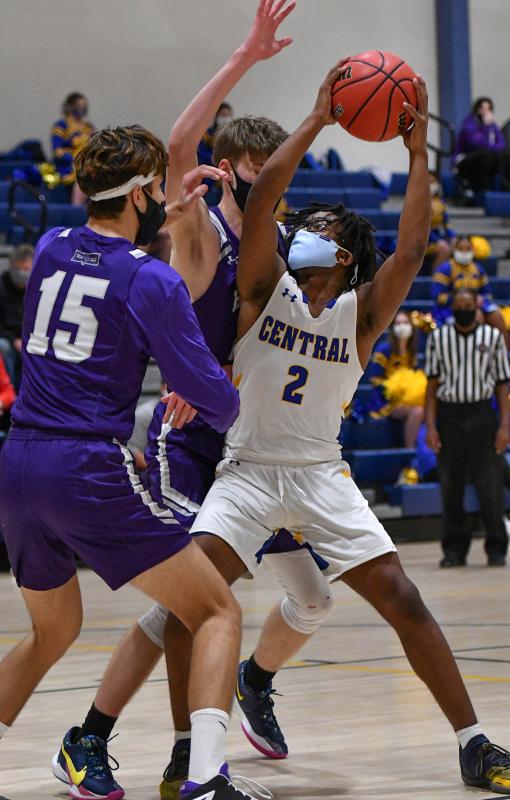 Central’s Jeremiah Wilson looks to go strong to the basket.