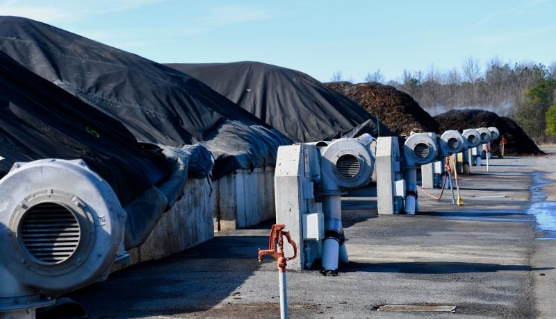 Large bunkers filled with compost are covered to help maintain a constant temperature around 160 degrees. The compost will remain in the bunkers for about 30 days before moving on to the next phase of the process.