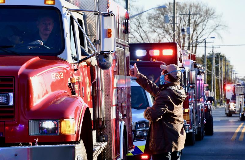 Beebe Healthcare President and CEO David Tam thanks a long line of first-responders gathered to pay tribute April 9, 2020, to Beebe staff.