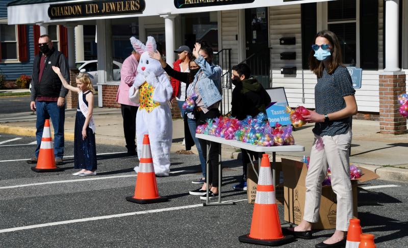 Volunteers are ready to hand out bags of eggs at one of two stops around The Circle.