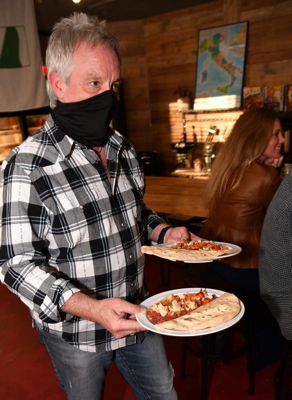 Paul Cullen serves the beef tartare with giardiniera (Italian relish), black olive and wheat crackers.