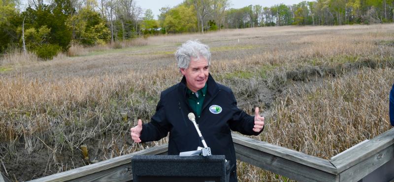 DNREC Secretary Shawn Garvin tells those assembled on the St. Jones boardwalk that every day is Earth Day at DNREC.