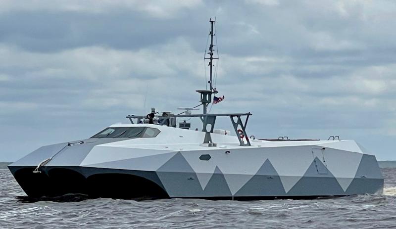 The camo cat waiting for passage through the swing bridge across the Alligator River, between Albemarle and Pamlico sounds.