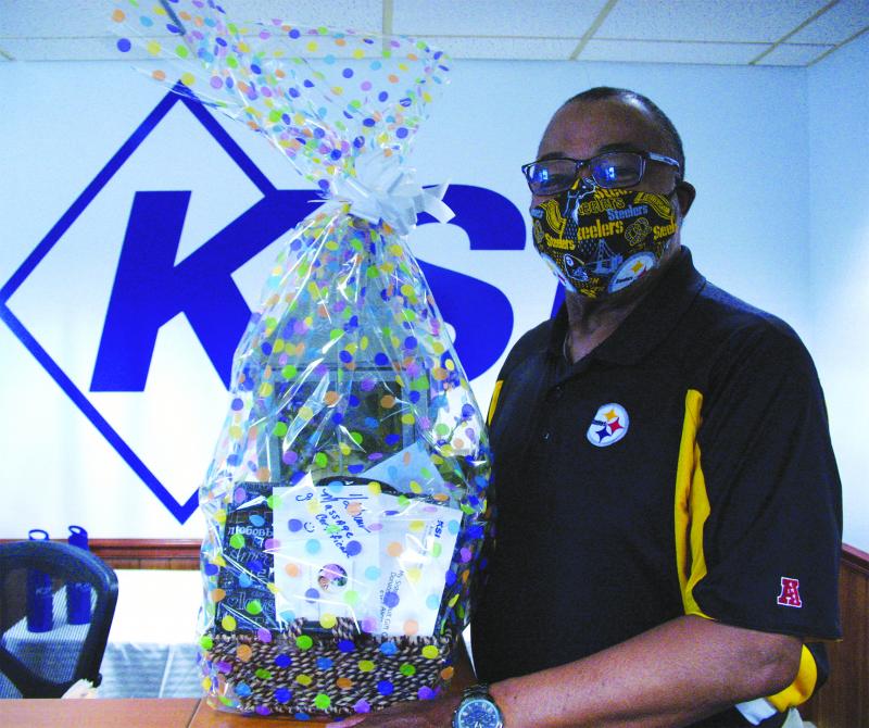 Frederick A. Duffy, a member of KSI’s board of directors, won the Day of Indulgences prize package valued at $334, containing a $50 Dolce gift card, two Dolce T-shirts, a gift certificate for 30-minute service at Massage By Hand, a Mary Kay travel roll bag filled with Mary Kay products, a silk flower arrangement and a $25 My Sister’s Fault gift card. SUBMITTED PHOTOS